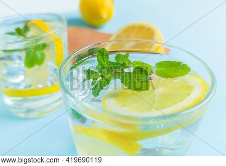 Lemonade With Mint Ice And On A Wooden Board, Refreshing Drink