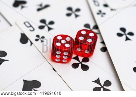 Dice On Cards In A Casino With A Drawn Nine