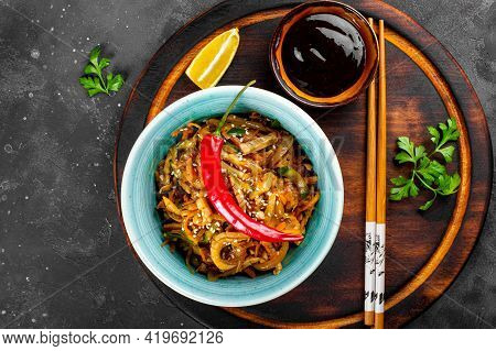 Traditional Asian Appetizer He Or Hwe, Squid Salad With Vegetables In A Bowl On The Wooden Board And