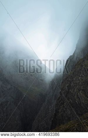 View of a misty Krossanesfjall mountain in Iceland