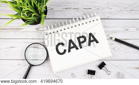 Capa Text Concept Write On Notebook With Office Tools On The Wooden Background