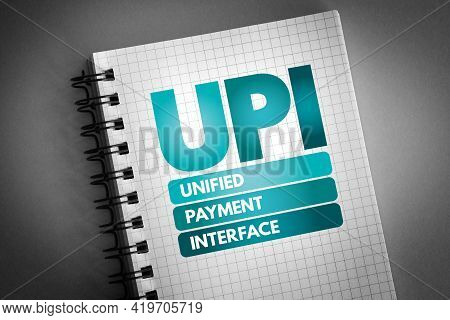 Upi - Unified Payment Interface Acronym On Notepad, Business Concept Background