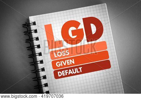 Lgd - Loss Given Default Acronym On Notepad, Business Concept Background