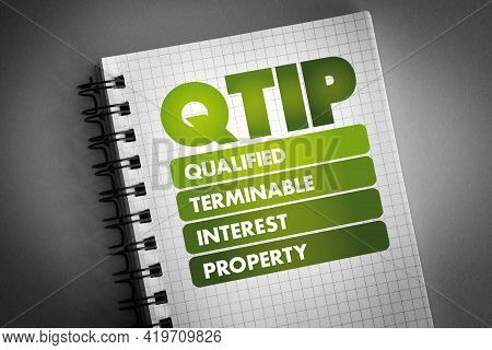 Qtip - Qualified Terminable Interest Property Acronym On Notepad, Concept Background