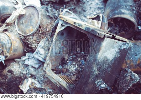 Burnt Trash. Remains Of Burnt Garbage. Household Waste. Waste Disposal. Garbage In The Barrel. Dispo