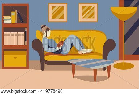 Women Is Sitting And Reading Book In Living Room On Sofa