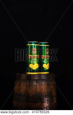 Can Of Perlenbacher Radler Beer On Beer Barrel With Dark Background. Illustrative Editorial Photo Sh
