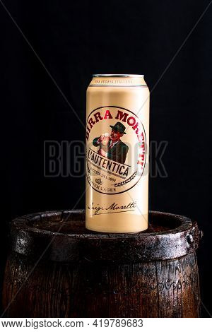 Can Of Birra Moretti Beer On Wooden Barrel With Dark Background. Illustrative Editorial Photo Buchar