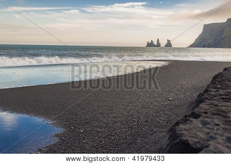 Black Beach In Background Dyrholaey - Vik, Iceland.