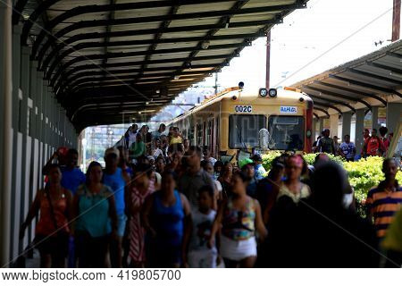 Salvador, Bahia, Brazil - September 17, 2016: Passengers Are Seen Disembarking From A Suburban Train