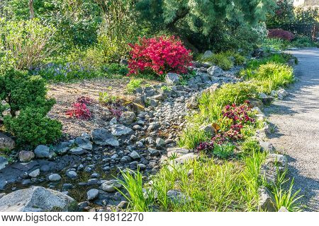 A Landscape Shot Of A Dry Creek Bed In Seatac, Washington.