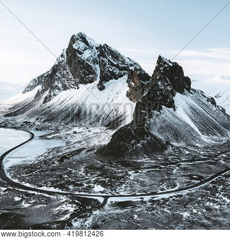 Drone view of a snow covered Eystrahorn mountain in Iceland