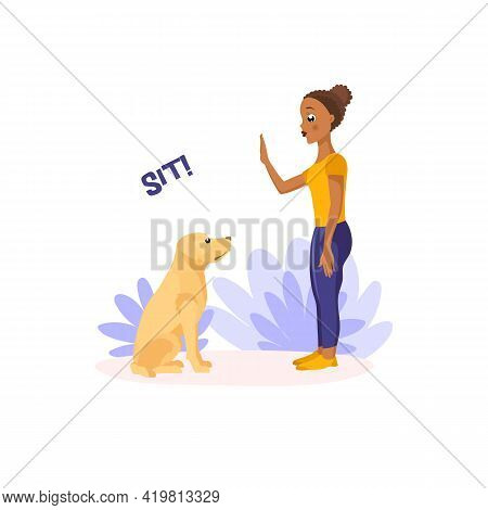 Dark Skinned African-american Girl Training Labrador Retriever In The Park. Showing Hand Jesture Sit
