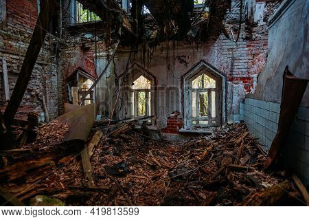 Inside Old Ruined Abandoned Historical Mansion In Gothic Style.