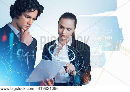 Two Business People Looking At The Paper Pensive. Double Exposure With Earth Globe And Stock Market 