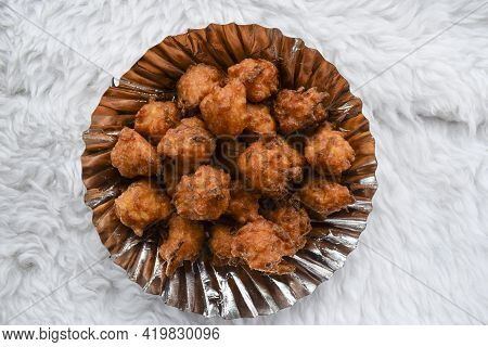 Tasty Rice Bhajiya Or Pakoda Also Known As Rice Ball Fritters Is Made Out Of Leftover Rice, Gram Flo