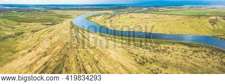 Rechytsa, Gomel Region, Belarus. Aerial View Of Dnieper River. Sky Above Green Meadow And River Land