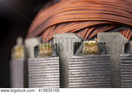 Rotor Of An Electric Motor Close Up. Copper Motor Windings.