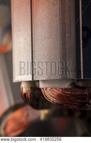 Stator Of An Electric Motor Close Up. Copper Motor Windings.