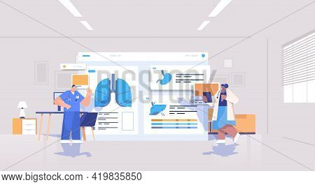 Mix Race Doctors Team Learning Patient Organs Analyzing Medical Data On Virtual Board Medicine Healt