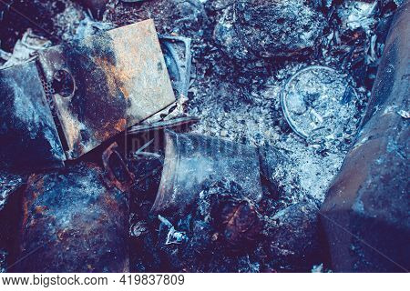 Burnt Trash. Remains Of Burnt Garbage. Household Waste. Waste Disposal. Garbage In The Barrel. Dispo