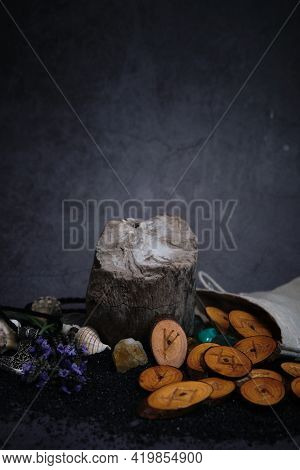 Homemade Wooden Runes On A Dark Background