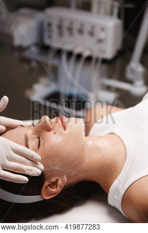 Skin Care Treatment And Cosmetology. Close Up Of Woman At Spa Salon, Cosmetic Clinic, Beautician Doc