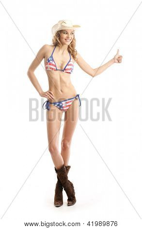 Young, slim, healthy and beautiful woman in swimsuit over the white background
