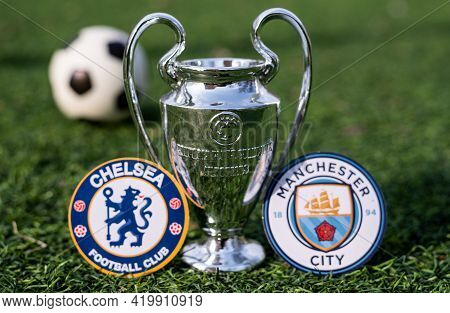 April 16, 2021 Moscow, Russia. The Uefa Champions League Cup And The Emblems Of The Manchester City 