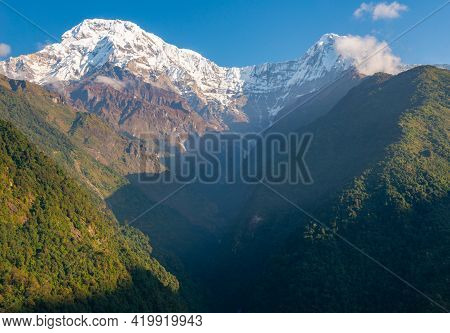Beautiful View Of Mt.annapurna South And Mt.hiunchuli View From Chomrong Village On The Way To Annap