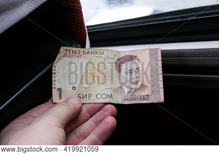 Azerbaijan, Baku - Nowember 2009: Man Hand With Manat Isolated On Black Background, Hand Holding Out