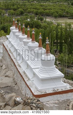 White Buddhist Stupa Or Pagoda In Tibetan Monastery Near Village Leh In Ladakh Region, Noth India