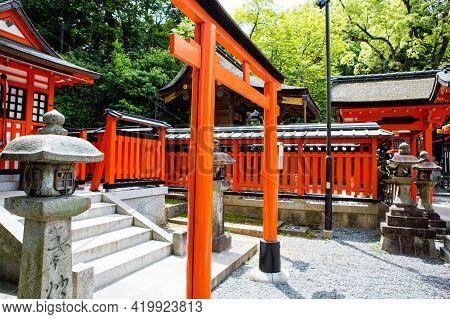 Fushimi Inari Taisha Shrine In Kyoto, Japan With Beautiful Red Gate And Japanese Garden. Red Torii G