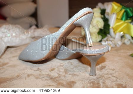 Bride Heels On A Bed With Motif