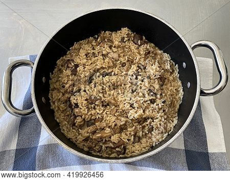 Italian Mushroom Risotto In A Large Pan. (risotto Ai Funghi)