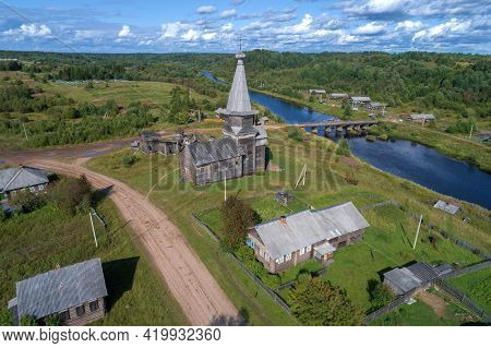 The Ancient Wooden Church Of Elijah The Prophet In The Rural Landscape Of August Afternoon. Samino (