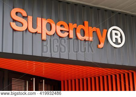 Bordeaux , Aquitaine France - 05 05 2021 : Superdry Logo Brand And Orange Sign Text For Store Of Bri