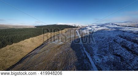 Snow Covered Fan Gyhirych Mountain In The Fforest Fawr Section Of Brecon Beacons National Park In So