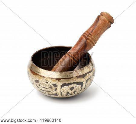 Copper Singing Bowl And Wooden Mallet Isolated On White Background. Musical Instrument For Meditatio