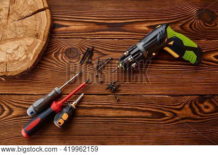 Screwdrivers and self tapping screws on stump