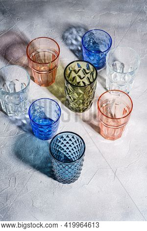 Colorful Faceted And Geometric Drink Glass, Group Of Empty Green, Red, Blue And Transparent Drinkwar