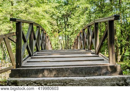 Wooden Bridge At The Source Of The River Bosna Near The City Of Sarajevo.