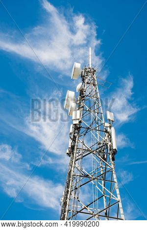 Radio, Communication And Cell Tower On Blue Sky Background