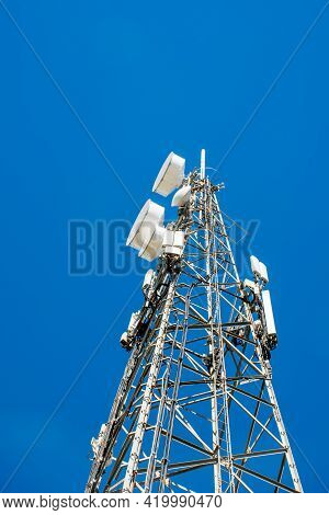 Radio, Communication And Cell Tower On Blue Sky Background