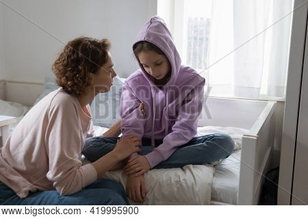 Affectionate Young Mommy Supporting Stressed Teen Daughter.