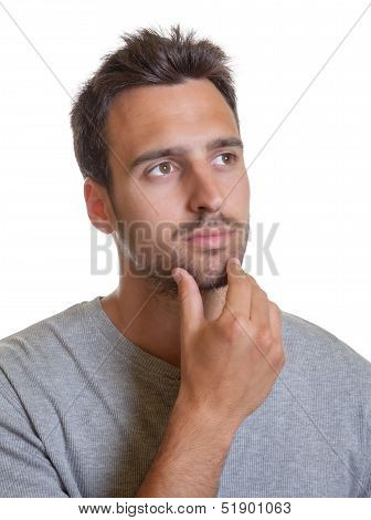 Thoughtful latin man