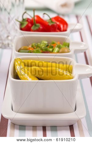 Chili sweet red and pickled green peppers