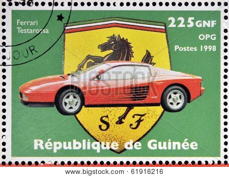 GUINEA - CIRCA 1998: Stamp printed in Guinea dedicated to anniversary of Enzo Ferrari shows Ferrari