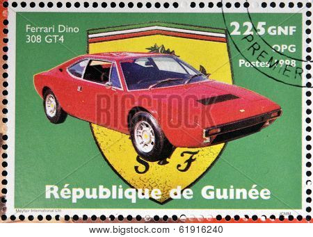 GUINEA - CIRCA 1998: Stamp printed in Guinea dedicated to anniversary of Enzo Ferrari shows Ferrari