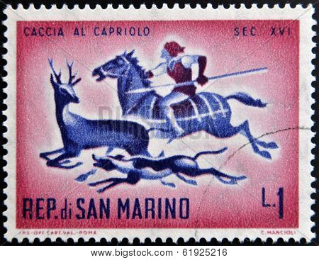 SAN MARINO - CIRCA 1961: A stamp printed in San Marino dedicated to hunting shows Hunting Roebuck